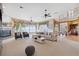 Expansive living room with fireplace, large windows, and an open floor plan at 1473 Sail Harbor Cir, Tarpon Springs, FL 34689