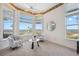 Cozy sitting room features comfortable seating and scenic water views at 1473 Sail Harbor Cir, Tarpon Springs, FL 34689