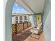 Charming front porch with seating area at 155 Patty Ann Blvd, Palm Harbor, FL 34683