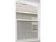 Close up of a window with white blinds at 16177 Glowing Grove Ave, Odessa, FL 33556