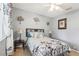 Cozy bedroom with decorative wall art, ceiling fan, and unique curtains at 1641 Bayfield Ct, Trinity, FL 34655