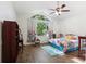 Cozy bedroom with colorful decorations, ceiling fan, and a big window at 1641 Bayfield Ct, Trinity, FL 34655