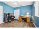 Comfortable room with blue walls, and a ceiling fan at 1641 Bayfield Ct, Trinity, FL 34655