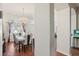 Dining room with chandelier, window, and view into the rest of the house at 1641 Bayfield Ct, Trinity, FL 34655