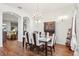 Sophisticated dining room features a decorative hutch, chandelier, and seamless flow to other living spaces at 1641 Bayfield Ct, Trinity, FL 34655