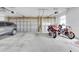 Spacious three car garage with ample room for parking and storage at 18328 Treehaven Dr, Hudson, FL 34667