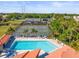 Community amenities include a swimming pool, tennis courts, and well-maintained landscaping at 2410 Hammock Pine Blvd # 2410, Clearwater, FL 33761