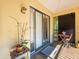 Relax on your balcony with a table and chairs at 2410 Hammock Pine Blvd # 2410, Clearwater, FL 33761