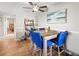 Cozy dining area with tile floors, natural light, and shelving for decorative items at 2410 Hammock Pine Blvd # 2410, Clearwater, FL 33761