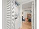 Convenient in-unit laundry area featuring a stacked washer and dryer, maximizing space and efficiency at 2410 Hammock Pine Blvd # 2410, Clearwater, FL 33761