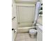 Neutral bathroom featuring a shower-tub combo, toilet and decorative shelving at 24862 Us Highway 19 N # 203, Clearwater, FL 33763