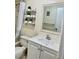 Neutral bathroom featuring a shower-tub combo, toilet and vanity at 24862 Us Highway 19 N # 203, Clearwater, FL 33763