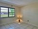 Bedroom with natural light and backyard view at 24862 Us Highway 19 N # 203, Clearwater, FL 33763