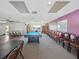 Bright billiards room with a pool table and seating; great spot for socializing and playing games at 24862 Us Highway 19 N # 203, Clearwater, FL 33763