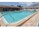 Close-up shot of sparkling community pool, perfect for swimming laps or lounging poolside at 24862 Us Highway 19 N # 203, Clearwater, FL 33763