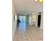 Large living room featuring tile flooring and sliding glass doors for ample sunlight at 24862 Us Highway 19 N # 203, Clearwater, FL 33763
