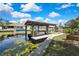 Private boat dock and canal access provide endless opportunities for waterfront living and recreation at 279 Maple Ave, Palm Harbor, FL 34684