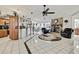 Open-concept living area combines living, dining, and kitchen spaces, perfect for modern living at 279 Maple Ave, Palm Harbor, FL 34684
