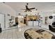 Bright and airy living space with seamless flow between living, dining, and kitchen areas at 279 Maple Ave, Palm Harbor, FL 34684
