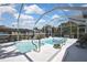Sparkling in-ground pool with a screened-in enclosure, perfect for relaxation and recreation at 279 Maple Ave, Palm Harbor, FL 34684