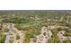 Aerial view of the property in a golf community at 3013 Appleblossom Trl, Spring Hill, FL 34606