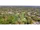 Stunning aerial view of the golf course and surrounding community, showcasing lush greenery and manicured fairways at 3013 Appleblossom Trl, Spring Hill, FL 34606