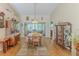 Bright dining room with wood floors at 3013 Appleblossom Trl, Spring Hill, FL 34606