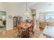 The dining room is next to the living room at 3013 Appleblossom Trl, Spring Hill, FL 34606