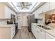 Bright, modern kitchen with stainless steel appliances at 3013 Appleblossom Trl, Spring Hill, FL 34606