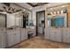 Vanity area features double sinks with granite countertops, and white cabinets at 3026 Wentworth Way, Tarpon Springs, FL 34688