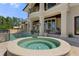 Beautiful backyard with a luxurious swimming pool, spa, and patio for outdoor living and entertaining at 3026 Wentworth Way, Tarpon Springs, FL 34688