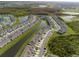 Aerial shot of a housing community featuring homes built around beautiful winding ponds and greenery at 31718 Blue Passing Loop, Wesley Chapel, FL 33545