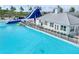 Enjoy the community's massive lagoon with white sand beach, dining, waterslides, and ample seating at 31718 Blue Passing Loop, Wesley Chapel, FL 33545