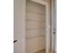 Walk-in pantry featuring wire shelving and door to the blinds at 31718 Blue Passing Loop, Wesley Chapel, FL 33545