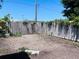 Corner lot backyard with wooden privacy fence at 3309 Bayport Dr, Holiday, FL 34691