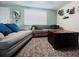 Comfortable seating in a living room with soft natural lighting and a cozy, stylish rug, perfect for relaxation at 3309 Bayport Dr, Holiday, FL 34691