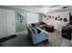 Inviting living room with neutral walls, modern furnishings, and lots of natural light at 3309 Bayport Dr, Holiday, FL 34691