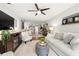 Open concept living space with living room, dining area, and kitchen at 4140 Passport Ln # 204, New Port Richey, FL 34653