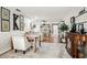 View of open floorplan with dining and kitchen beyond living area at 4140 Passport Ln # 204, New Port Richey, FL 34653