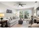 Comfortable living room featuring a large window and cozy decor at 4140 Passport Ln # 204, New Port Richey, FL 34653