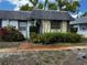 Charming cottage-style home with a well-manicured front yard and an inviting entrance at 4223 Sheldon Pl # H, New Port Richey, FL 34652
