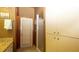 Bathroom features a granite countertop vanity, tile floors and walk in shower at 4475 Rachel Blvd, Spring Hill, FL 34607