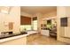 Bright bathroom with tiled floors, jetted tub, and vanity with makeup table at 4475 Rachel Blvd, Spring Hill, FL 34607