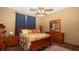 Bedroom featuring a ceiling fan, and comfortable bed at 4475 Rachel Blvd, Spring Hill, FL 34607