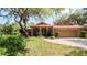 Charming single-story home with brick accents and well-manicured landscaping at 4475 Rachel Blvd, Spring Hill, FL 34607