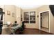Functional home office with a modern desk, natural lighting, and a view to the exterior at 4475 Rachel Blvd, Spring Hill, FL 34607