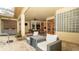 Covered patio has an outdoor seating area and access to interior at 4475 Rachel Blvd, Spring Hill, FL 34607