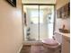 Standard bathroom with frosted shower door and neutral finishes at 4748 Yellowstone Dr, New Port Richey, FL 34655
