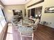 Relaxing screened patio with comfortable seating and views of the outdoors at 4748 Yellowstone Dr, New Port Richey, FL 34655