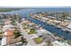 Aerial view of a beautiful waterfront community with convenient boat access and lush landscaping at 5033 Cabrilla Ct, New Port Richey, FL 34652